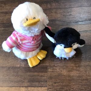 Two webkinz: penguin and another bird